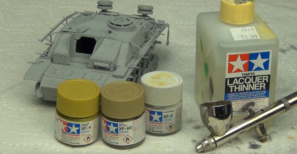 What Supplies Do I Need for Painting Camouflage on Model Tanks